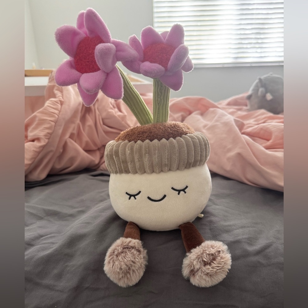 NWOT “Greenhouse” smiling flower plush with legs